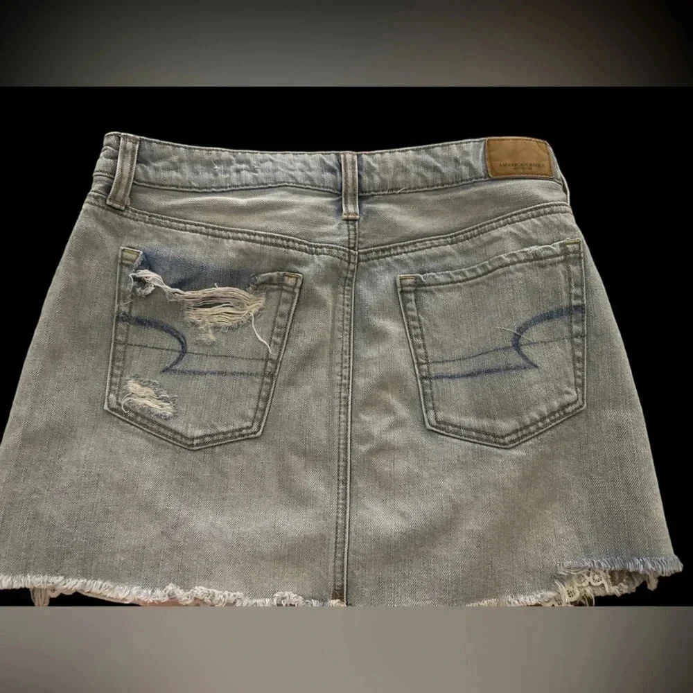 American Eagle denim mini skirt with peekaboo lace